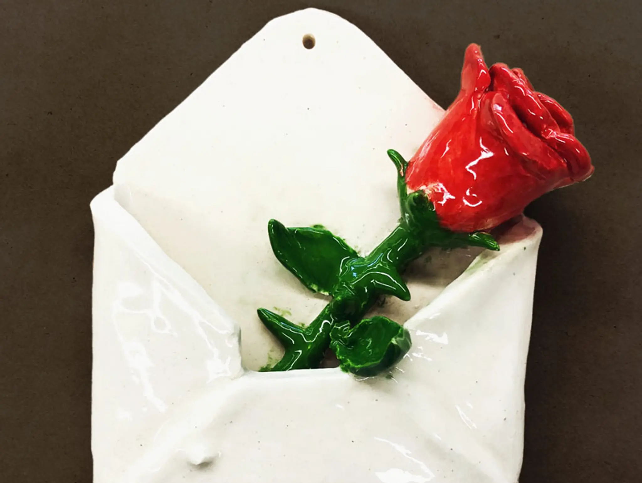 Symbolic Clay Envelopes